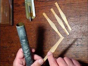 Scoring and beveling bassoon cane in preparation to form a reed blank.