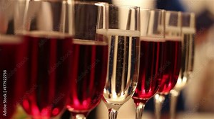 Glasses with alcohol drinks, glasses of wine and champagne are on the buffet table, red wine in glasses, champagne by the glass, buffet table with alcohol in a restaurant, New Year, Christmas