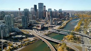 Calgary, Alberta, Canada - October 8 2023 : Downtown Calgary skyline and Bow River in autumn season. Aerial view of City of Calgary, Alberta, Canada.