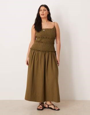 ASOS DESIGN Curve crinkle maxi sundress with shirred dropped waist in olive  | ASOS