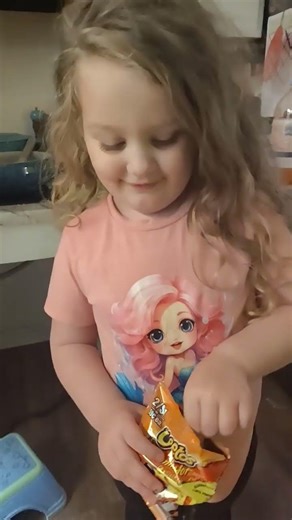 my little sister trying Hot Cheetos