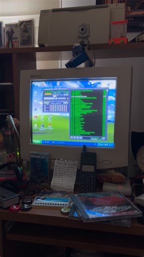 Retro Computer on Instagram: "Back in the 2000s, a computer desk was a colorful little world of its own — CDs stacked everywhere, floppy disks scattered around, a bulky printer on the side, and the whole setup glowing with that nostalgic Windows vibe. #retrocomputer #retrogame #90s #2000s"
