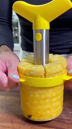 How a Hand Tool Effortlessly Cores and Slices a Pineapple into Perfect Vertical Pieces,Quick + Easy