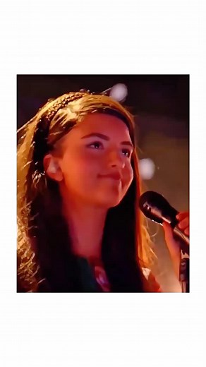 At just 13 years old, Angelina Jordan left the entire world speechless 🥹✨ Her breathtaking rendition of Queen’s “Bohemian Rhapsody” on America’s Got Talent: The Champions turned silence into pure awe. From her very first note, you could feel the emotion, the power, and the soul of someone far beyond her years. 🎶 Angelina didn’t just sing the song — she transformed it. Every lyric carried weight, every pause built emotion, and by the end, even the judges couldn’t hide their tears. 💫 This perfo