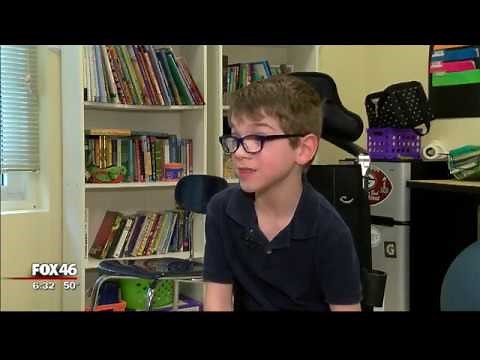 Teacher helps wheel-chair bound student jump rope