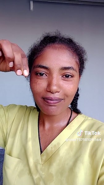 Adjusting Hair in a Casual Setting