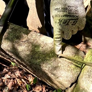Close-up look shows how tomb builders prevented collapse by carving a groove into the stone and securing it with iron. Even though the tomb is worn and broken, this small piece of engineering connects us to the hands that built it more than a century and a half ago. History survives in the details even the ones buried deep #historiccraftsmanship #oldcemetery #stepasideadventures | Adventures Into History