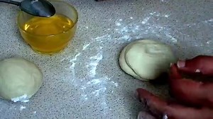 Frozen Paratha By cook with Faiza Ingerdients: 1: Plain flour 1kg 2: Sugar 1/4 Cup 3: Salt 1 1/2 Ts 4: Ghee 1/4 Cup 5: Water as required to make the dough Recipe: 1: Mix together all the Ingredients and add the water slowly to make a medium hard dough, cover & keep aside for 15mins. 2: Make balls size of a tennis ball then roll it into a roti shape, put 1Ts of ghee & sprinkle a bit of flour over it. Now roll it into a tube shape & then slightly squees the ends and twist the dough in a round form