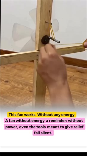 MemeXNews on Instagram: "A fan without energy is a reminder: without power, even the tools meant to give relief fall silent. . . This fan works without batteries or power outlets. It uses simple mechanical motion. Some designs use hand cranks. Likes Others use pull strings or stored tension from rubber bands. 320 When energy is released, the blades spin and moveair. 包 Gears and lightweight parts help keep motion 1,249 smooth. The system shows how movement can replace electricity for small tasks.