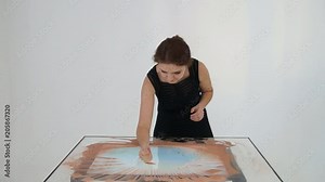 Drawing with sand. Drawing sand on a screen. Sand Artist. Hands draws. Animation
