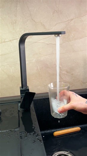 How do you pour water into a glass?