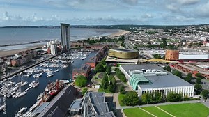 Editorial Swansea, UK - August 30, 2023: Drone view from Swansea Marina including the new Swansea Arena, Leisure Centre and Maritime museum in South Wales UK