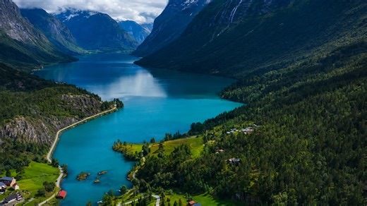 Hidden fjord valley surrounded by untouched mountain forests