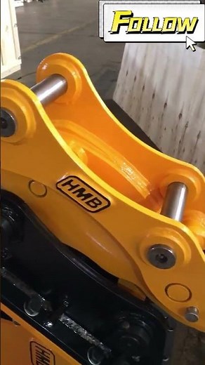 OEM HMB backhoe hammer with a hydraulic quick hitch