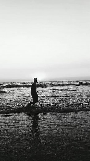 Serene Beach Walk in Black and White