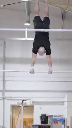 Farthest backflip between two horizontal bars: 6 m (19 ft 68 in) by Ashley Watson 🇬🇧 | Guinness World Records