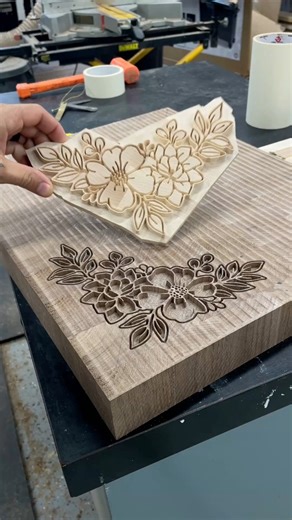 Another one 😍 we shipped another one of these beauties last week! 20x16 walnut board with a lower 1/3 flower inlay in maple. This year my goal is to get some boards out ahead of time so I’m not totally slammed during the holidays 😮‍💨 get those orders in now the cut of is coming quick! #cuttingboards #cnc #woodworking | Two Moose Design