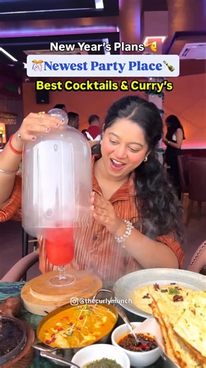 Anshita Saxena | Food & Travel 🇮🇳 on Instagram: "✨ New Year Eve Plans = SORTED with @currysncocktails ✨ If you’re still figuring out where to celebrate 31st December, Curry N Cocktail is the place to be! 🍸🍽️ With a stunning ambience, spacious seating, and picture-perfect corners, this newly opened spot is ideal for New Year parties. Enjoy fancy cocktails, drool-worthy food, and a vibrant vibe that sets the mood right ✨ 🎉 Special New Year Offer: They’re offering a special unlimited New Year
