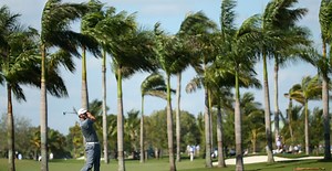 2014 WGC Cadillac Championship: Tiger Woods chasing Dustin Johnson, Matt Kuchar at top of leaderboard