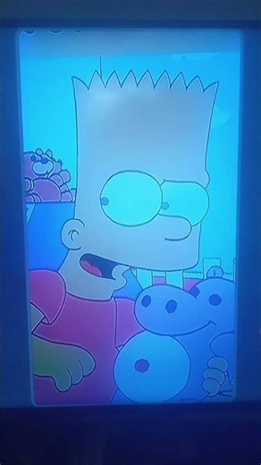 Homer Simpson is eating hamburgers