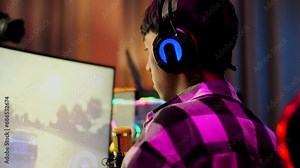 Asian Boy Streamer Celebrating Winning Game On Computer. Live Stream Video Game