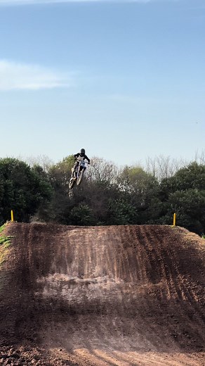 Motocross Action: Riders Conquer Muddy Terrain