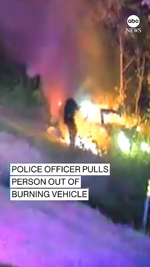 TO THE RESCUE: Dash camera footage shows the moment a police officer in Oklahoma rescued a driver from a burning vehicle moments before it became entirely engulfed in flames. | ABC News
