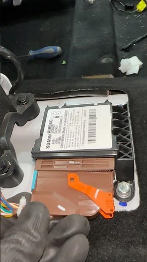 How to replace airbags control module #airbag #module #shorts