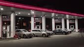 Cars on gasoline refueling station, time lapse
