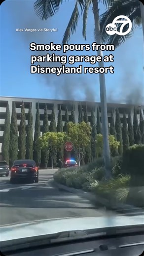Smoke pours out of the Disneyland parking structure in Anaheim, Calif. on Friday after a fire. #disneyland #socal #fire #parkinggarage | ABC7 News
