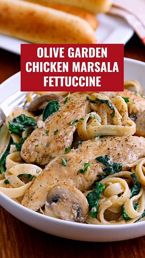 Indulge in the rich flavors of Copycat Olive Garden Chicken Marsala! Tender chicken breasts smothered in a savory Marsala wine sauce with earthy mushrooms – a deliciously comforting dish that brings the taste of Italy to your home kitchen. Try this easy-to-follow recipe for a restaurant-worthy meal that will impress! | Fork To Spoon
