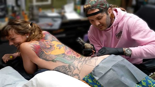 8 hours under the needle: A phoenix backpiece rises in real time