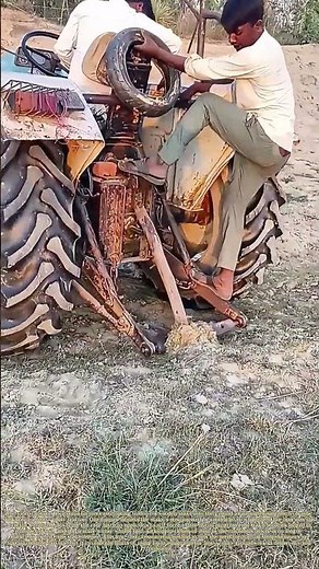 Driving A Stake With A Tractor: How Rural Farmers Use Machine Power To Anchor Posts