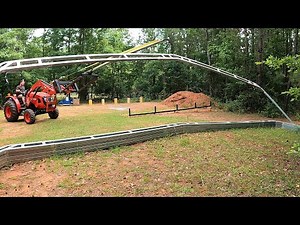 Metal Pole Barn Complete Build. Tractor Boom Pole Lifting Trusses and Tin Roof Panels.