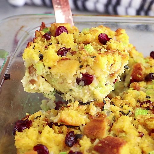 This Gluten Free Cornbread Stuffing is the perfect side for your Thanksgiving meal! It’s sweet and savory and packed with herbs and cranberries and the best gluten-free cornbread! This vegetarian stuffing is easy to prepare and will definitely be a winner on your holiday table. Full printable recipe: https://lexiscleankitchen.com/gluten-free-cornbread-stuffing/ | Lexi's Clean Kitchen