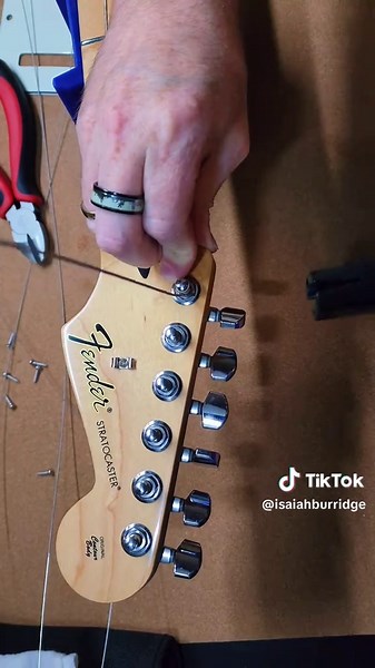 Efficient Guitar Stringing Method