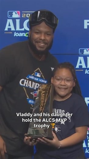 TSN | Vladdy shares a sweet moment with his daughter as they both hold the ALCS MVP trophy 🏆 | Instagram