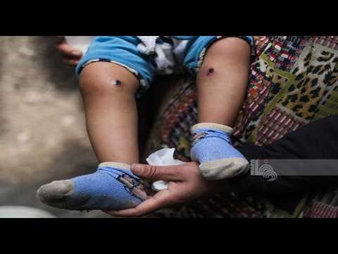 الطفل جواد أبو نصار يتعرض للتعذيب من قوات الاحتلال خلال اعتقاله مع والده قرب مخيم المغازي وسط غزة