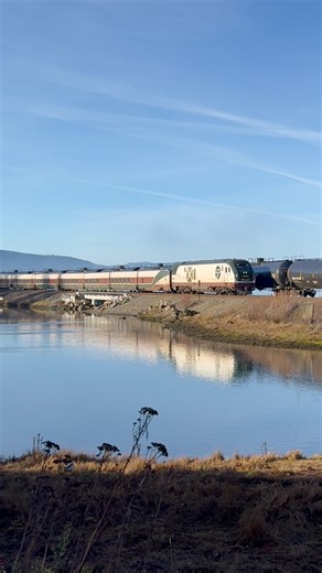 On a crisp fall morning, Amtrak Cascades train 516 approaches its station stop in Bellingham, WA with Puget Sound in the distance. Amtrak Cascades serves multiple different cities in the Pacific Northwest including Eugene, Salem, and Portland, Oregon, Centralia, Tacoma, Seattle, Everett, and Bellingham, Washington, and Vancouver, BC. Trains 516 and 519 make a daily round trip from Seattle to Vancouver and return, a nice option for a day trip for many Washingtonians living in Seattle and to the n