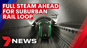 The state government is talking up the benefits of a major rail project that will take decades to complete. No one's saying how much the Suburban Rail Loop will cost - but there's a promise it will save commuters time when it's finished. 7NEWS at 6pm | www.7NEWS.com.au #7NEWS | 7NEWS Melbourne