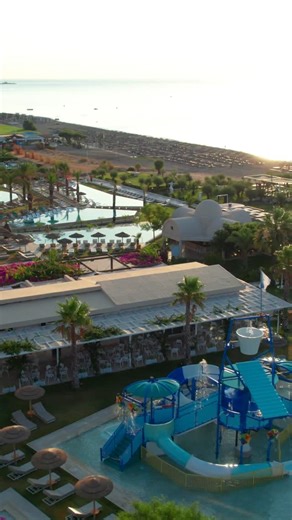 Pegasos Deluxe Beach Hotel on Instagram: "Aqua Tower 🌊..Where Family Fun meets Relaxation. Let your little ones dive into adventure,while you unwind in comfort by the pool 🏖️ _________________ Book your #summer2026 escape ➡️ https://bit.ly/pegasos_home #pegasoshotel #rhodes #pegasosmemories #familyfun❤️"