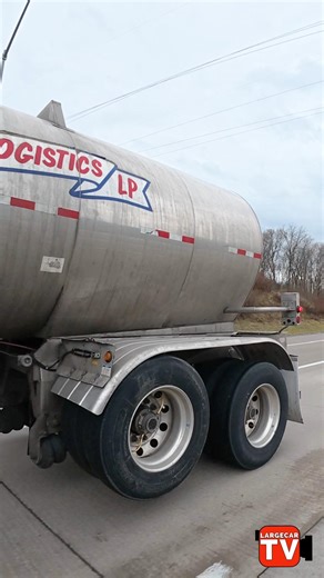 Red sloped nose chrome accessorized Peterbilt pulling that tanker with the axle up 🤪👀!