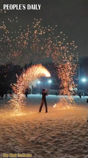 After a snowfall, a college martial arts student delivered a stunning traditional fire whip performance in Changzhi, north China’s Shanxi Province, sending sparks flying against the white-covered ground. | People's Daily, China