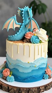 “Ocean Dragon Fantasy Cake🎂🐉🌊” — a stunning sculpted centerpiece featuring a gentle blue dragon surrounded by waves, roses, and golden accents, perfect for birthdays or themed celebrations that embrace magic, elegance, and mythical wonder. #cake #cakedecorating #fblifestyle #birthday | Angel Carrera