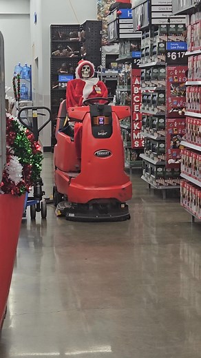 New employee at walmart cleaning the floor. | Robert Sims