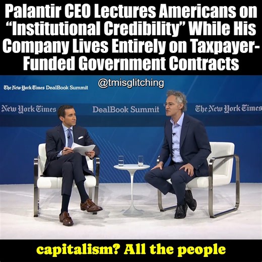 Palantir CEO Alex Karp Lectures Americans on “Institutional Credibility” While His Company Lives Entirely on Taxpayer-Funded Government Contracts Alex Karp, the CEO of Palantir Technologies—a company that has survived for two decades almost exclusively on massive, secretive U.S. government contracts funded by taxpayer dollars—took the stage to lament that ordinary Americans no longer trust institutions. He blamed “stupid decisions” by bailed-out business leaders who still collect huge bonuses wh