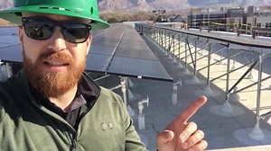 Have you ever seen a split micro/string inverter system? Here is (magic) Mike on one of our newest projects. Check this out!!!! | Intermountain Wind & Solar