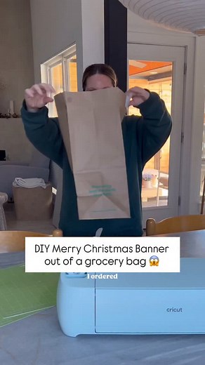 Grocery bag banner?! Now that’s a Christmas diy I can get behind!!! I used my cricket machine to cut this insulated grocery bag from Whole Foods into a merry Christmas Banner. Such a simple cycle DIY! #christmasdecor #homedecor #cricut #cricutmade #cricutmaker | Perkins On Parkway