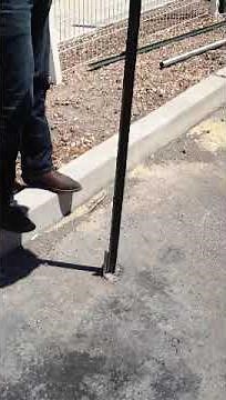 Driving post thru asphalt with REDI Driver gas powered post driver