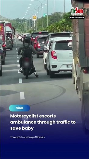 Motorcyclist escorts ambulance through traffic to save baby